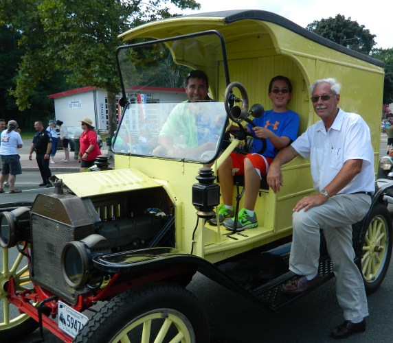 Photo by Jacqueline Bennett Three generations of the Hoch family that owns and operates Shady Glen Dairy Stores are pictured in their vintage dairy delivery truck at the 2012 Cruisin on Main in Manchester, CT. Left to right Bill Hoch, Jr., his son Taj Hoch and his father Bill Hoch, Sr.