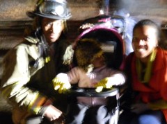 Windsor Firefighter Chris Baker with his wife Hope and their daughter Ava, 2.