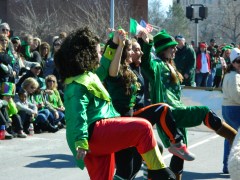 Irish step dancers perform in front of the reviewing stand.
