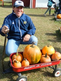 John Barbarotta shows the wagon full of pumpkins picked out by his granddaughter.