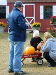 John Barbarotta and his wife drove up from Trumbull to bring theri granddaughter Reese to pick out a pumpkin or two.
