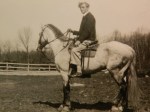 Dad/Big Johnny on horseback.