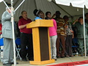 Singing the national anthem.