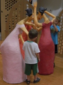 Eric and Tom Staba of Manchester, CT interact with the puppets.