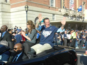 Univeristy of Connecticut President Susan Herbst (left) shown riding with Gov. Dannel Malloy in the Parade held April 13, 2014 in downtown Hartford, CT for the dual championship Huskies