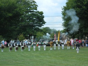 As host of a July 26 muster, the Colchester Continentals Fife & Drum Corps gave an opening musket salute.