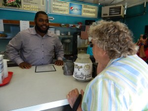 Chris Baker takes an order from Shirley King of Windsor Locks.