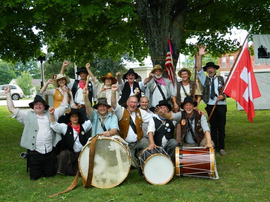 The Wild Bunch, a Swiss-American Fife & Drum corps show some spirit at the annual muster in Colchester, Connecticut held July 26, 2014.