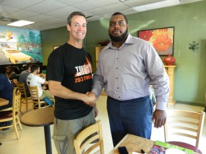 Bart's - where hometown heroes meet. NFL player Chris Baker shakes hands with fellow WHS football alum Dan Nolan, who served in Iraq and Afghanistan.
