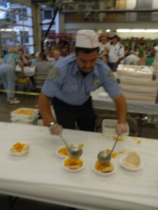 Two fistted peach pouring.