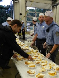 Firefighters respond to the Peach Festival call.