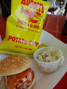 Plump and scrumptious, "Abbott's Lobster in the Rough" famous Hot Lobster Roll.