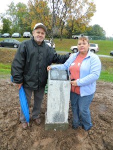 Gold Star parents Ceferino and gladys Rivera stand beside their son SSG Edwin Rivera's newly unveiled plague,