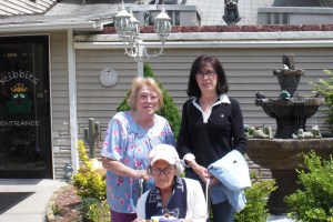 Muriel, her sister Candy and Mom shown at one of Muriel's favorite restaurants - Ribbits.