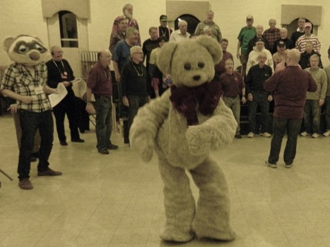 Photo by Jacqueline Bennett Teddy Bear puppet played UConn Puppet arts major Hailey Bendar during a rehersal  with the Silk City Chorus of "I'm Your Puppet." 
