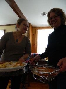 Michelle and Mary serve ouverdeves at Thanksgiving.