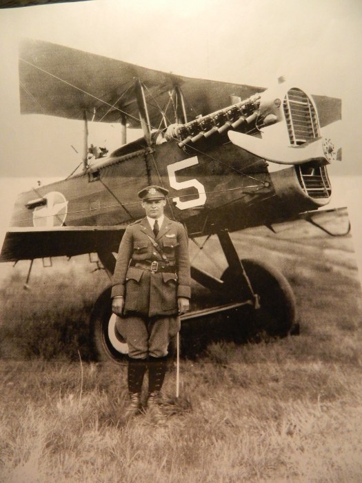 Harry Generous, born in Chaplin, Connecticut, shown standing by his bi-plane in the 1930s; cousin to WWII bomber pilot Alfred R. Generous and WWII fighter pilot Oliver E. "Bunker" Generous. Harry Generous rose to the rank of colonel, organized the CT Air National Guard and was a commander of Patrick Air Force Base .