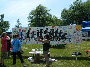 Interactive Art Projects included "Help Paint the Community Mural".