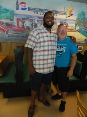 NFL's chris Baker and Windsor, Connecticut Mayor Donald Trinks, owner and general manager of Bart's Dive-In.