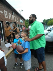 Chris poses with Anthony, 11, and Tyler, 7, Colapinto.