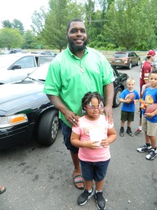 Chris with 6-six-old Makayla Rivera of Hartford