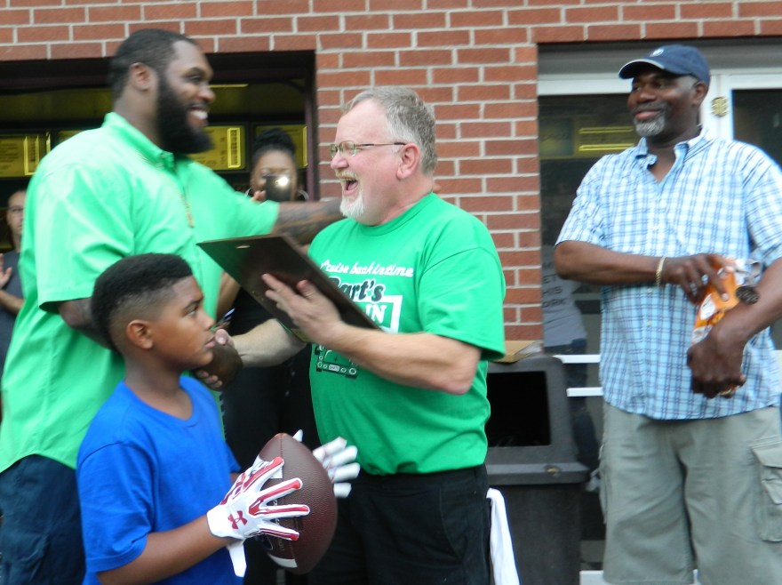 Windsor native Chris Baker will host his annual football camp today July 9, 2016 in his hometown where last night Mayor Donald Trinks presented Chris with a proclamation declaring "Chris 'Swaggy' Baker" Day. The presentation took place  at Bart's Drive-In, a local institution.