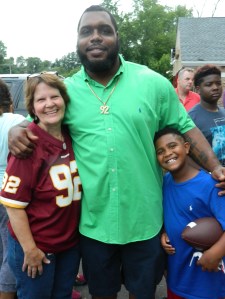 Carol englemann, owner and manager of the Beanery side of Bart's is a longtime Redskins fan - Carol and Chris are joined by his godson.