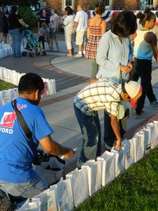 Community members insert the glowsticks.