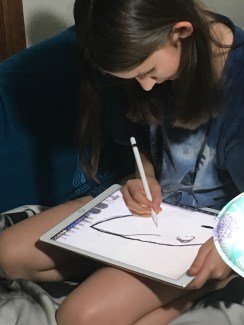 Courtesy photo - Sofia hard at work on her drawing.